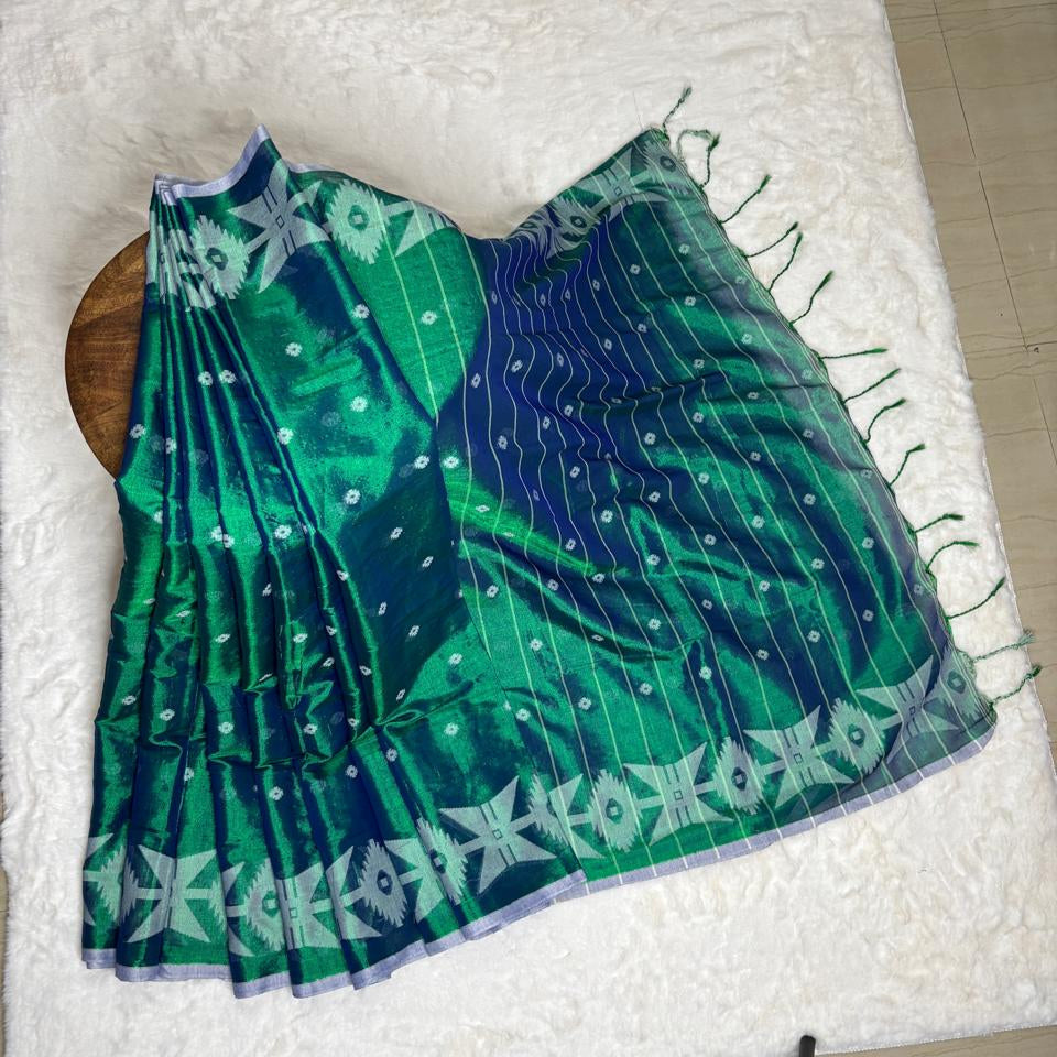 Green fabric with white patterns on a white background