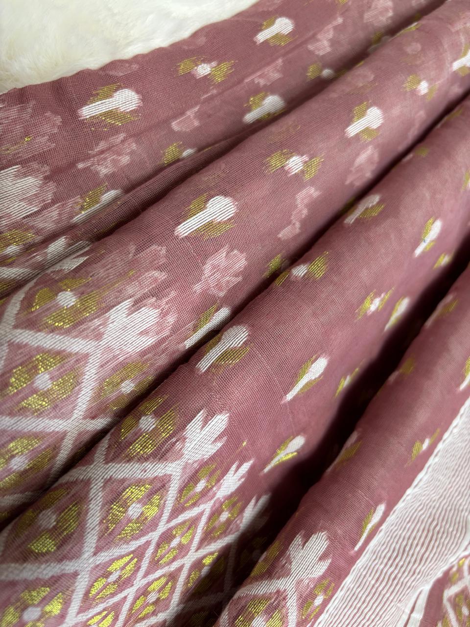 Folded fabric with a pattern of geometric shapes on a white background
