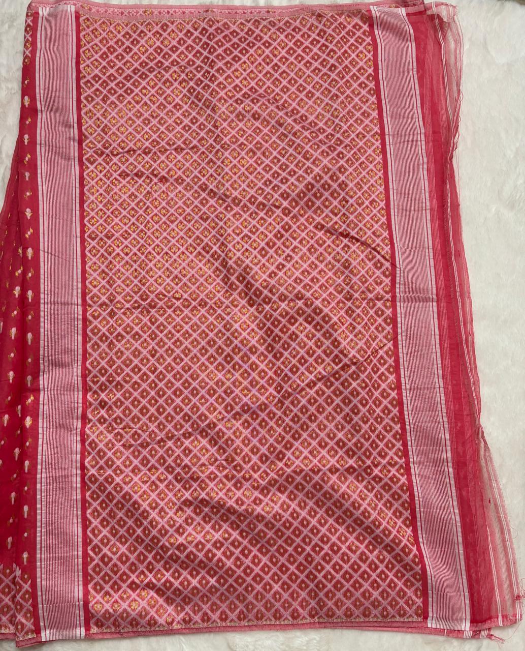 pink patterned fabric on a light gray background