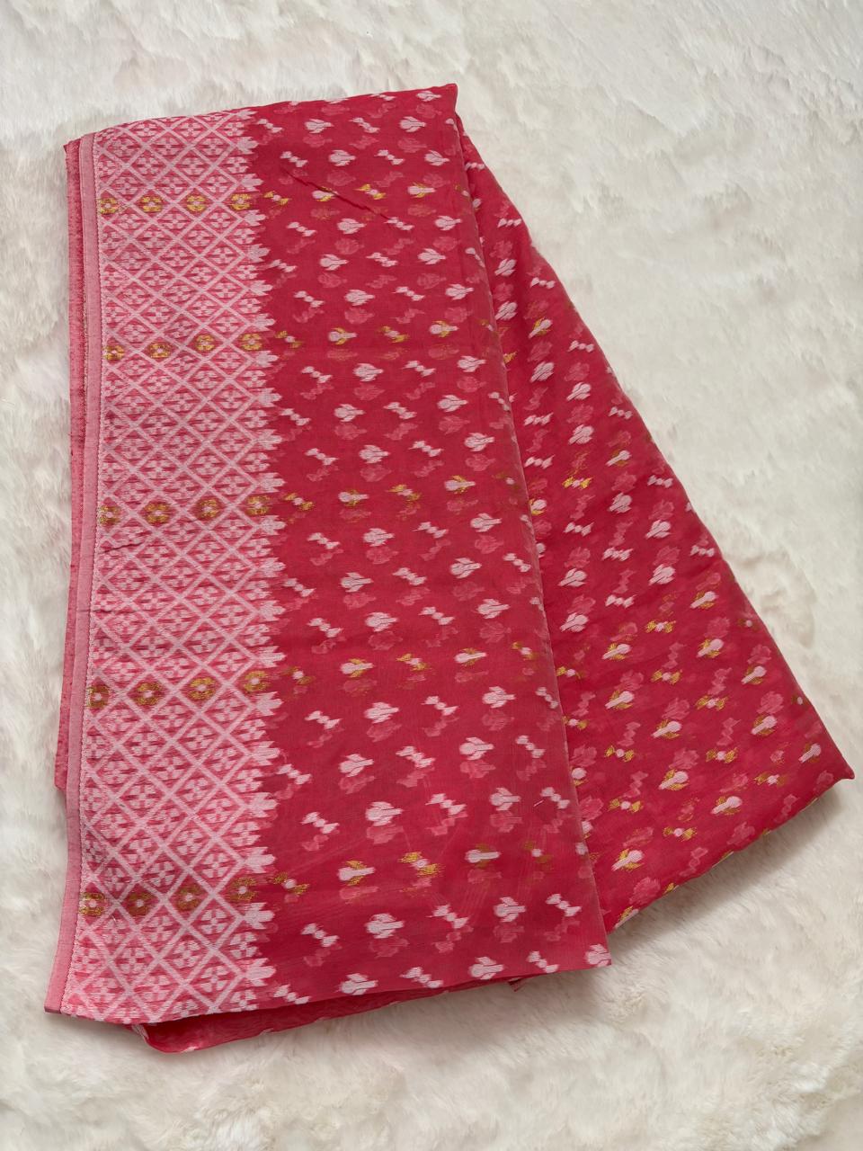 Pink fabric with a pattern on a light gray background