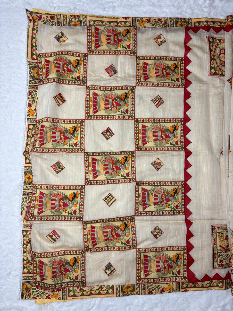 Decorative quilt with intricate patterns on a white background