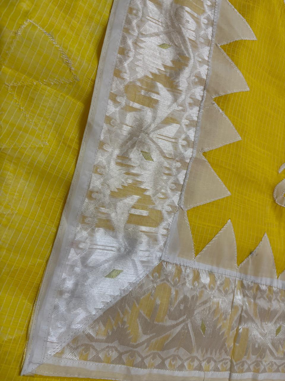 White fabric with geometric pattern on a yellow background