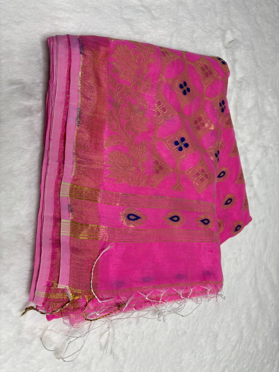 Pink saree with floral patterns on a white background