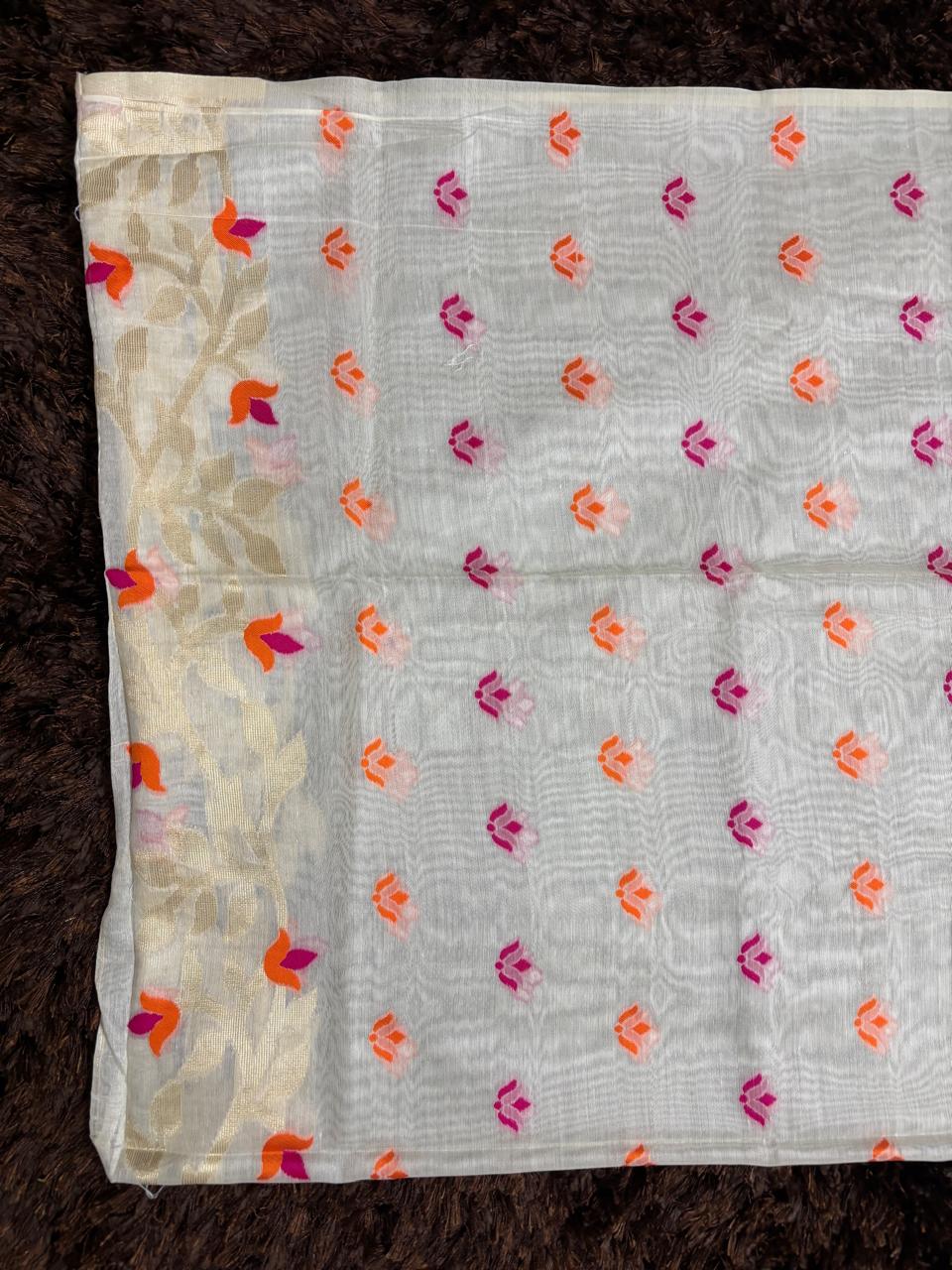 Floral patterned fabric on a dark brown background